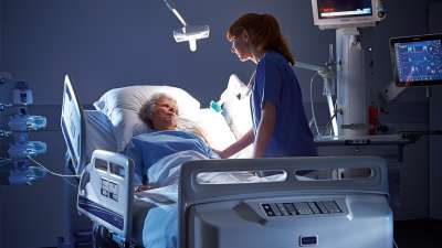 System-Nurse-with-Patient-in-ICU-Unit.jpg